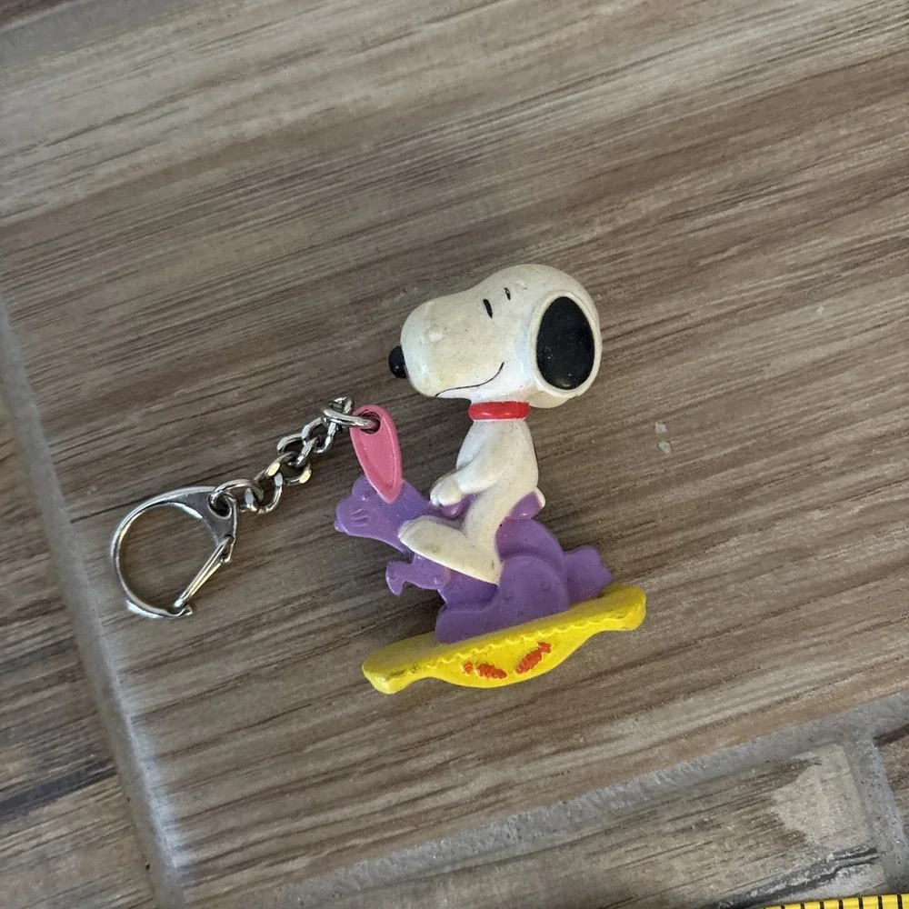 Peanuts‎ SNOOPY Key Chain...Riding a Purple Easter Bunny Rocking To
